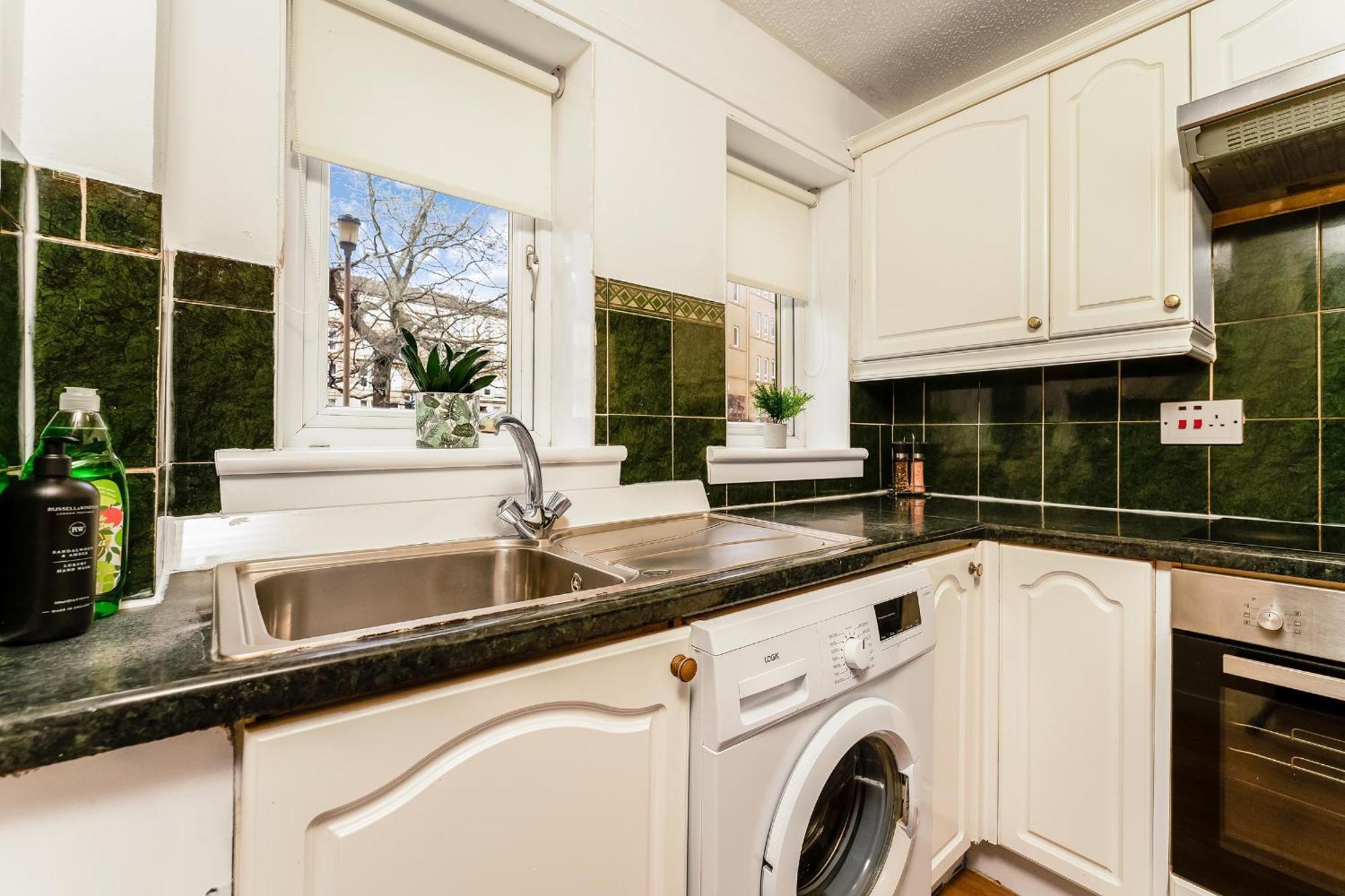 Spacious 2-bedroom Main Door With Private Parking